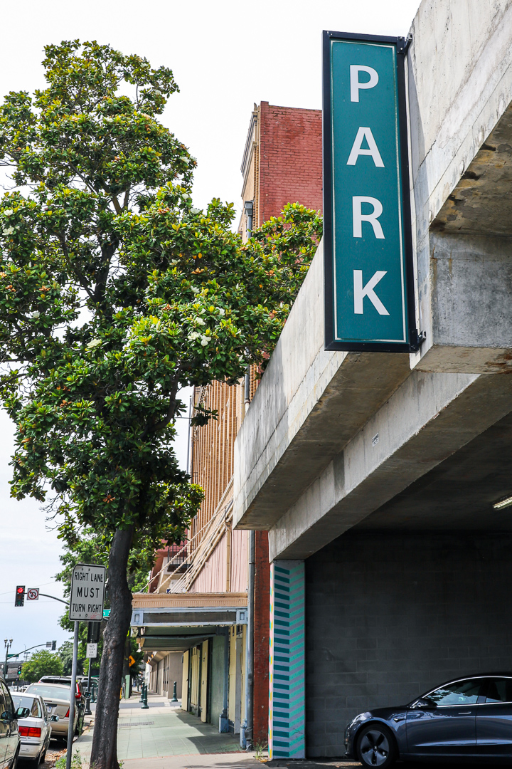 Sign over parking garage entrance that says, 'Park' in Downtown Stockton.